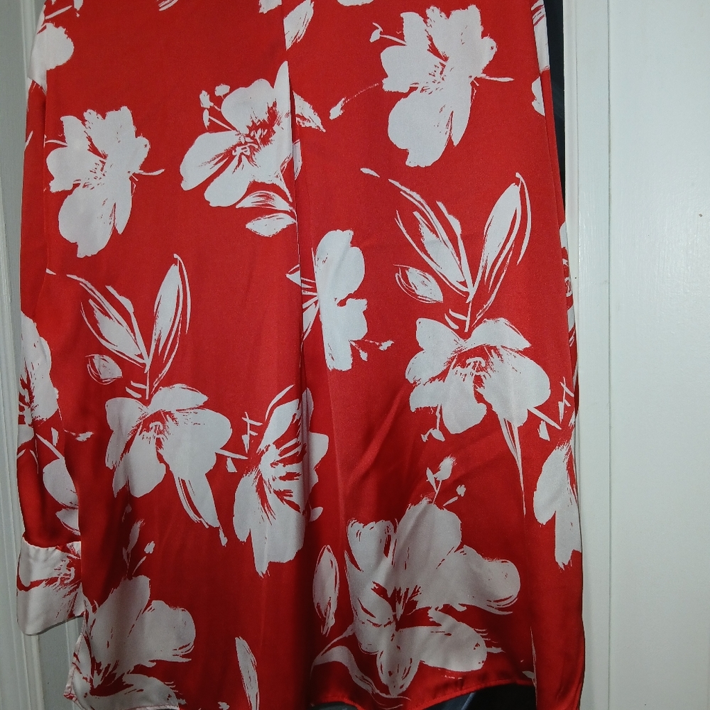 Red and white flower blouse.